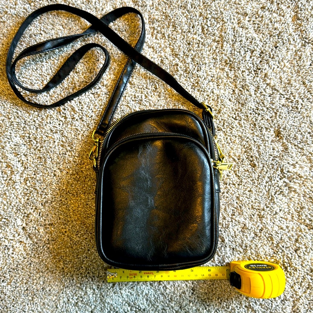 Black vinyl crossbody bag